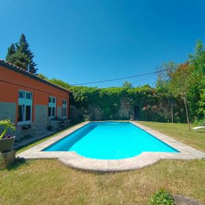 a swimming pool in the yard of a house at Errotazar apartamento rural K in Alsasua