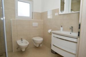 Kúpeľňa v ubytovaní Apartment Miki + 22 fotografií