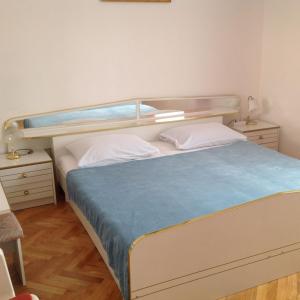 Posteľ alebo postele v izbe v ubytovaní Apartment Miki