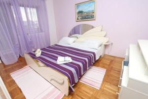 Posteľ alebo postele v izbe v ubytovaní Apartment Mare