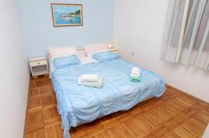 Posteľ alebo postele v izbe v ubytovaní Apartment Mare
