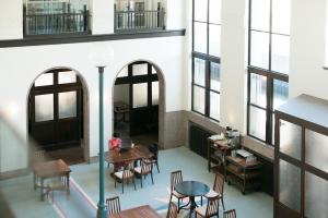 an overhead view of a room with tables and chairs at Toyooka1925 in Toyooka