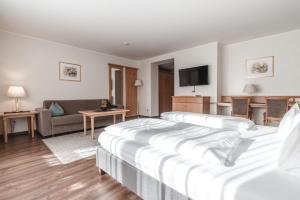 Postel nebo postele na pokoji v ubytování Hotel Reischach