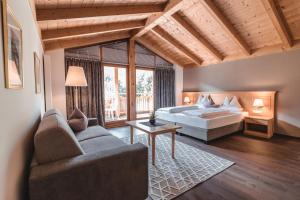 Postel nebo postele na pokoji v ubytování Hotel Reischach