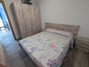 Postel nebo postele na pokoji v ubytování Appartamento Las Palmas