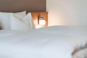 Postel nebo postele na pokoji v ubytování Hotel Reischach