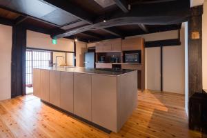 مطبخ أو مطبخ صغير في FARMSTAY miyuki-street "Hotaru"