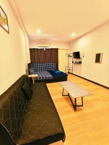 Χώρος καθιστικού στο SJ Api Api Apartment Homestay
