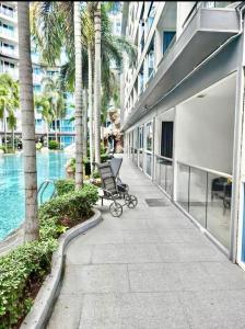 Bazén v ubytování Centara Pattaya Apartment nebo v jeho okolí