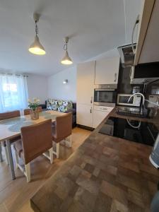 Kuchyň nebo kuchyňský kout v ubytování Sweet Home Lustig