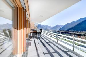 a balcony with a view of the mountains at Appartement Panorama Blick in Bürserberg +20 photos