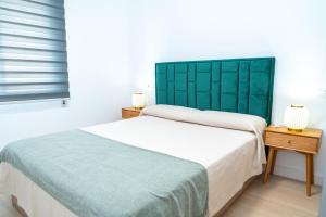 En eller flere senge i et værelse på De Ronda al Tajo