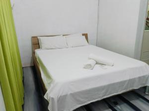 Voodi või voodid majutusasutuse Mylene Room Rental toas