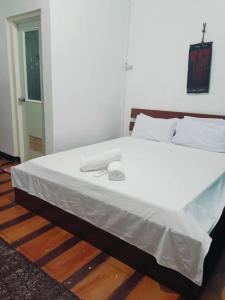 Voodi või voodid majutusasutuse Mylene Room Rental toas