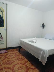 Voodi või voodid majutusasutuse Mylene Room Rental toas