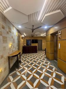 ครัวหรือมุมครัวของ Hotel M R Paradise