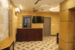 โทรทัศน์และ/หรือระบบความบันเทิงของ Hotel M R Paradise