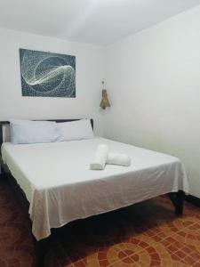 Voodi või voodid majutusasutuse Mylene Room Rental toas