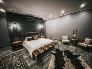 Ένα ή περισσότερα κρεβάτια σε δωμάτιο στο 4 Aces Outfitters Lodge +34 φωτογραφίες
