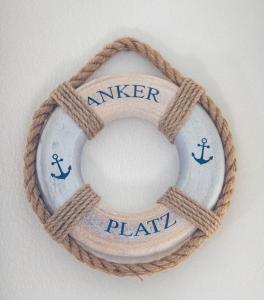 a rope ring with the words under replay on it at Ferienhaus Segelblick LUV in Holnishof