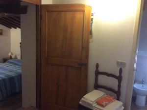 A bed or beds in a room at Agriturismo Podere Fiume
