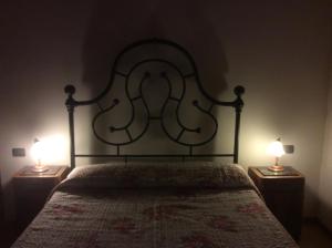A bed or beds in a room at Agriturismo Podere Fiume