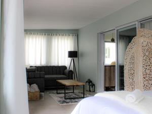 Postel nebo postele na pokoji v ubytování Storms River Peak Accommodation