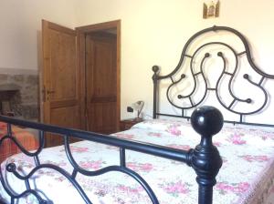A bed or beds in a room at Agriturismo Podere Fiume