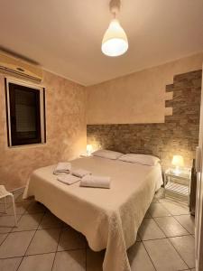 Postel nebo postele na pokoji v ubytování b&b ar colle 2