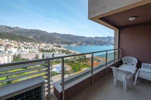 a balcony with a view of the ocean at Harmonia Budva 1 in Budva