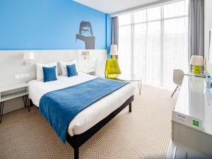 Posteľ alebo postele v izbe v ubytovaní Ibis Styles Wroclaw Centrum