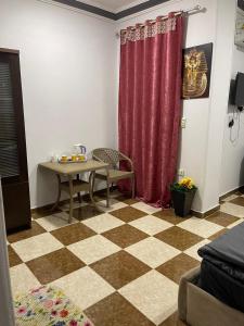 TV a/nebo společenská místnost v ubytování Pyramids International INN