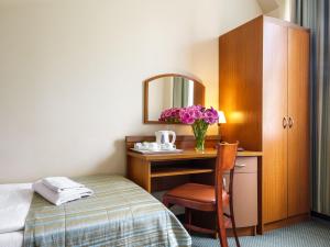 Postel nebo postele na pokoji v ubytování Hotel Galicya