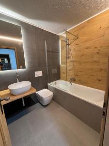 Koupelna v ubytování Appartamento chalet