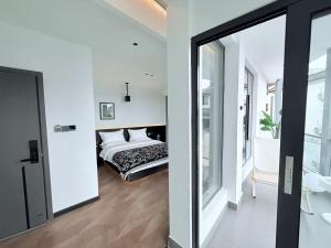 Postel nebo postele na pokoji v ubytování 山田心精品民宿 Valley Heart Inn