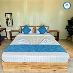 Postel nebo postele na pokoji v ubytování Naroth Beach Bungalow
