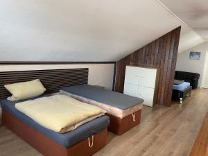 Postel nebo postele na pokoji v ubytování Loft apartment für bis zu 4 Personen