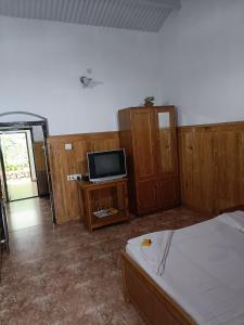 TV o dispositivi per l'intrattenimento presso Trilan Cottages - Donnington Road