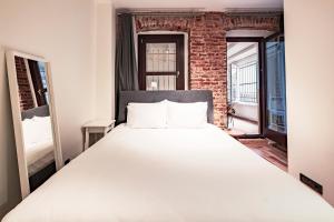 Postel nebo postele na pokoji v ubytování Homie Suites - Modern Apartments Nearby Istıklal Street & Galata Tower