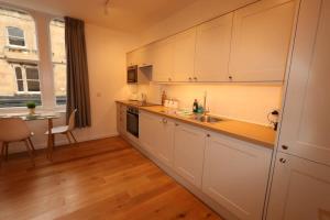 Η κουζίνα ή μικρή κουζίνα στο Alma Vale Apartments 3 - Hopewell +1 φωτογραφίες