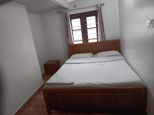 Letto o letti in una camera di Trilan Cottages - Donnington Road