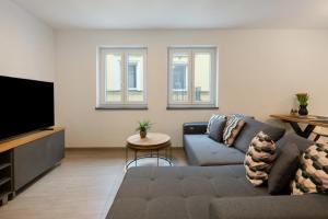 TV a/nebo společenská místnost v ubytování Wohnung 4 Rosenstraße
