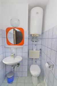 Koupelna v ubytování Apartments Ive