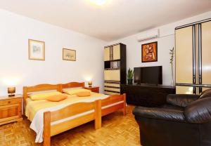 Posteľ alebo postele v izbe v ubytovaní Apartments Snjeza