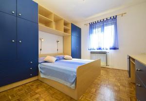 Posteľ alebo postele v izbe v ubytovaní Apartments Snjeza