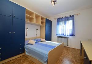 Posteľ alebo postele v izbe v ubytovaní Apartments Snjeza