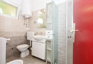 Kúpeľňa v ubytovaní Apartments Snjeza