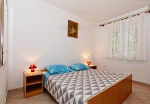 Posteľ alebo postele v izbe v ubytovaní Apartments Snjeza