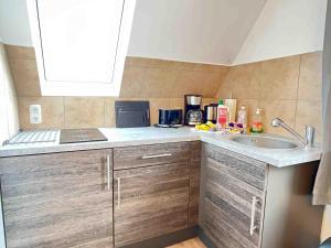 Η κουζίνα ή μικρή κουζίνα στο SAD803 - Zweistöckige Monteurwohnung +3 φωτογραφίες