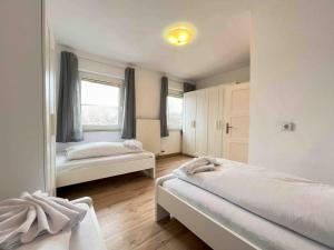 Ένα ή περισσότερα κρεβάτια σε δωμάτιο στο SAD803 - Zweistöckige Monteurwohnung